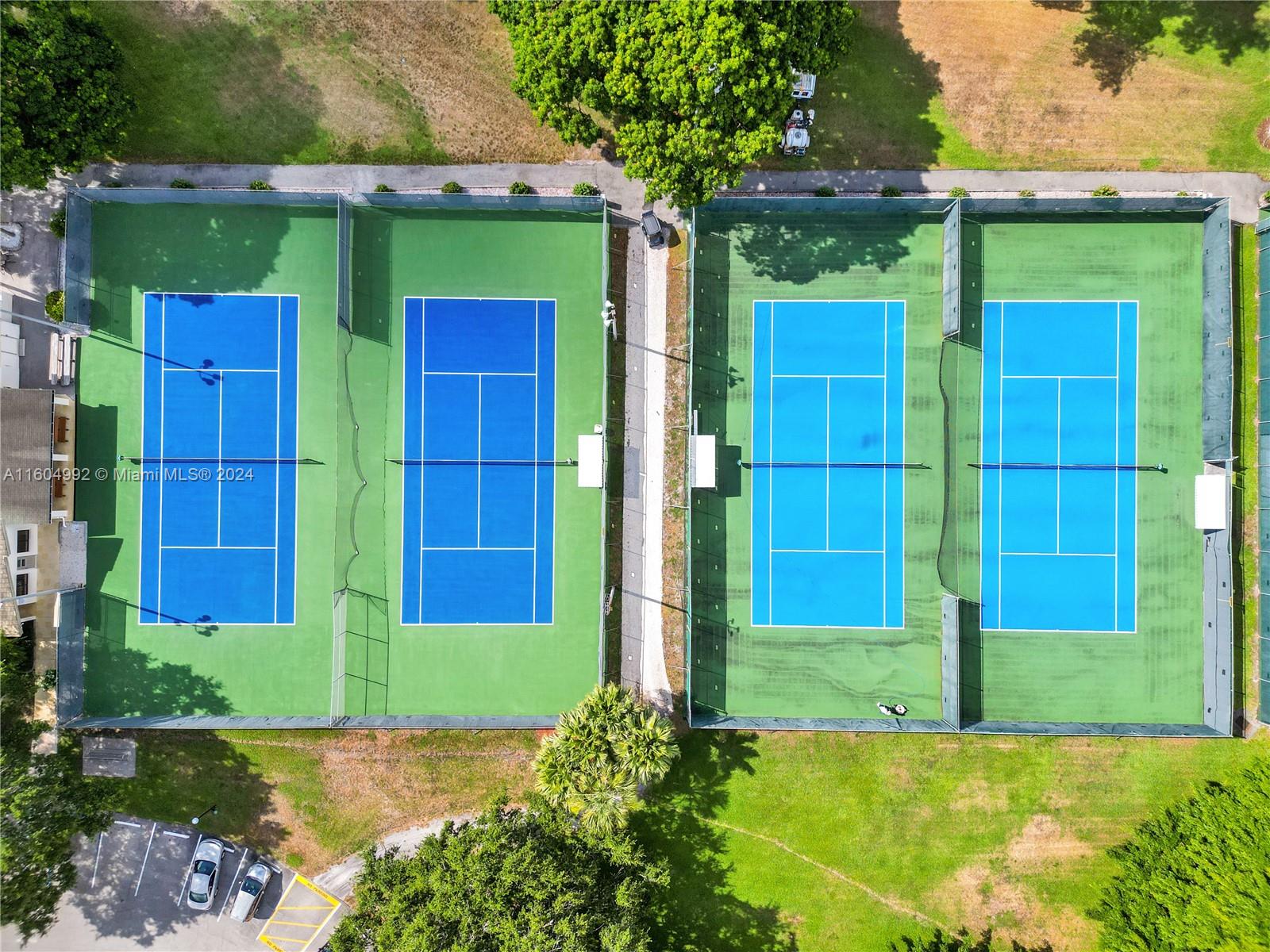 1802 Eleuthera Point, Unit E3 Coconut Creek, FL 33066 - Photo 53 of 78 front view of a house with a yard