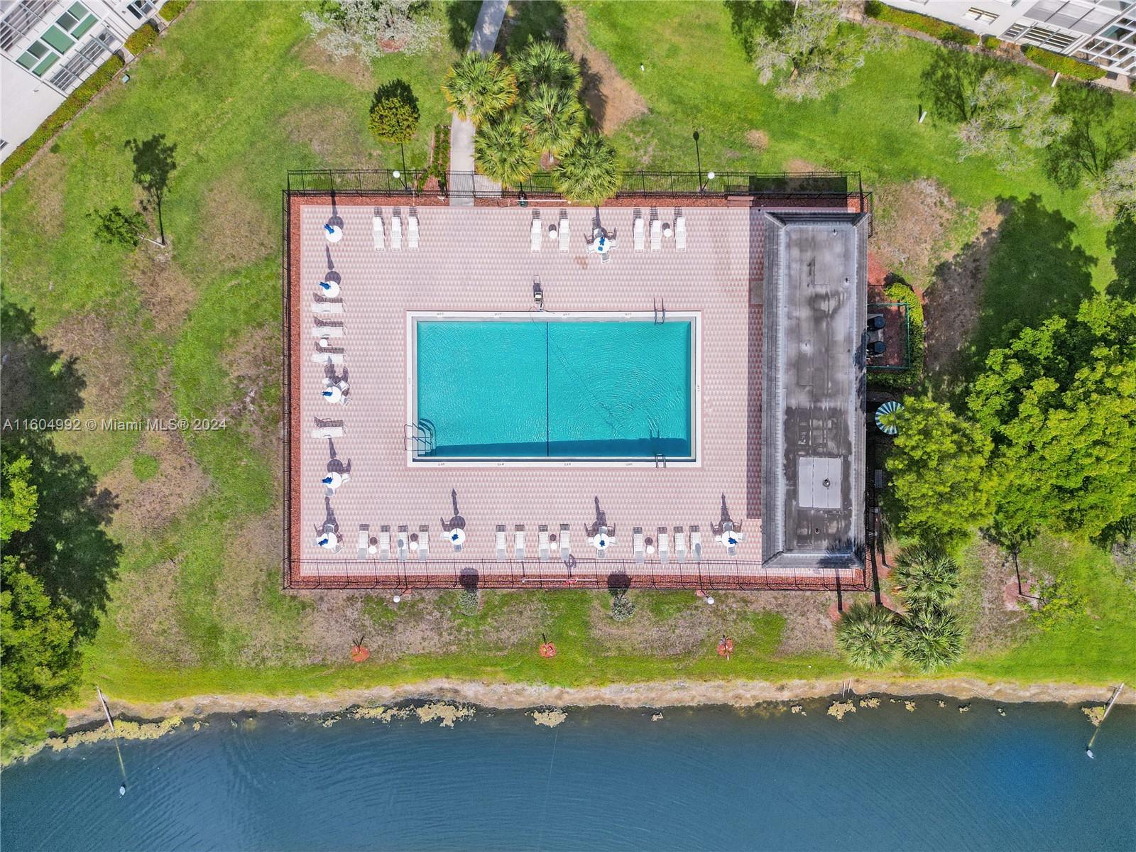 1802 Eleuthera Point, Unit E3 Coconut Creek, FL 33066 - Photo 56 of 78 a view of building with sign board