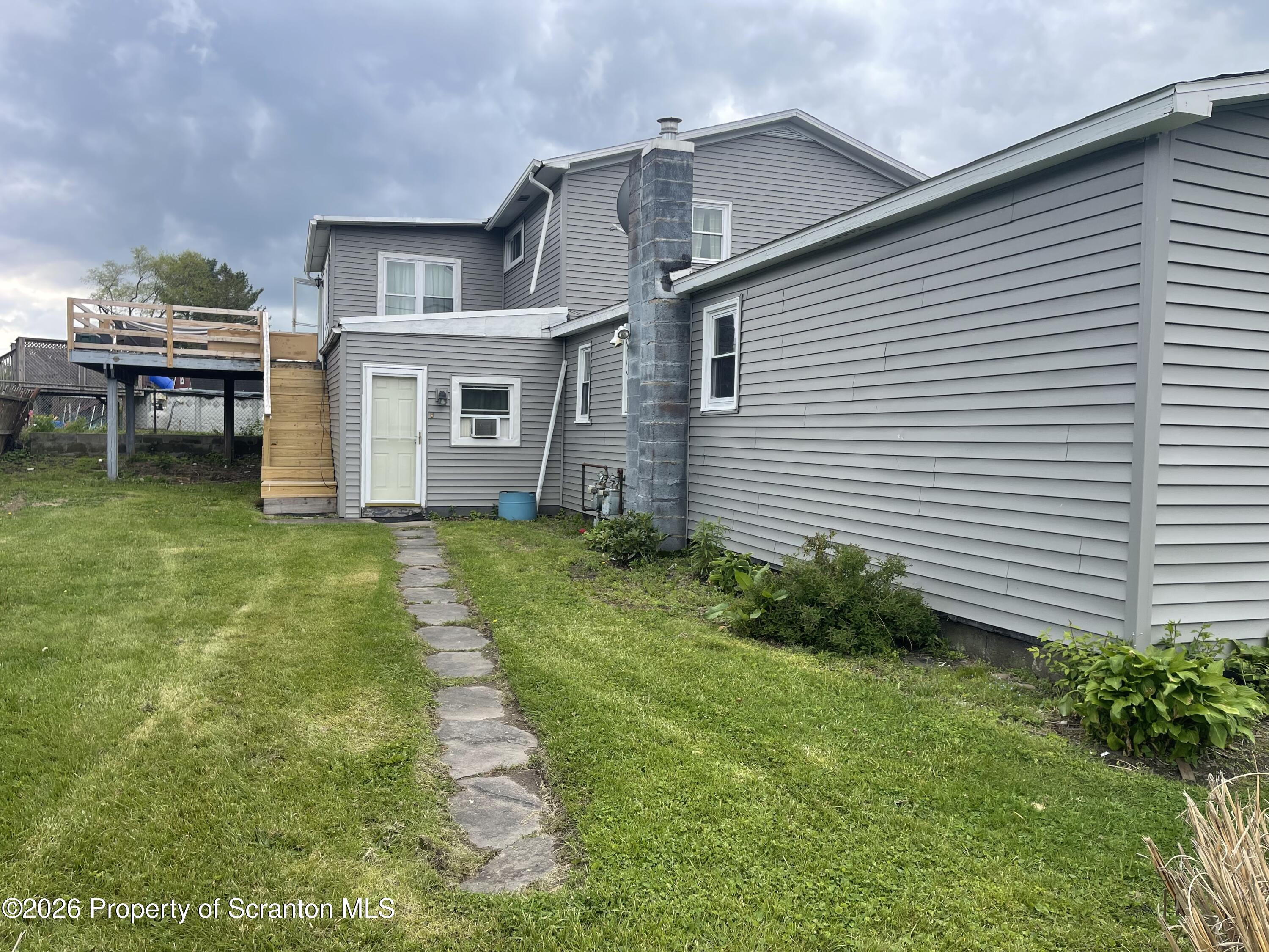 238 George Street Moosic, PA 18507 - Photo 23 of 23 a house view with a garden space