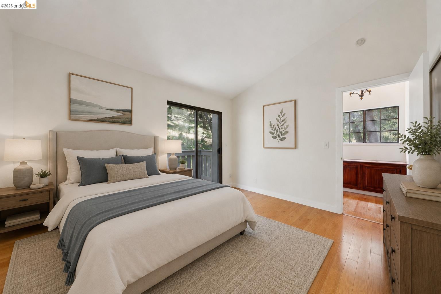 261 Redhawk Road Novato, CA 94949 - Photo 25 of 44 Bright bedroom featuring light wood-finish flooring and a vaulted ceiling