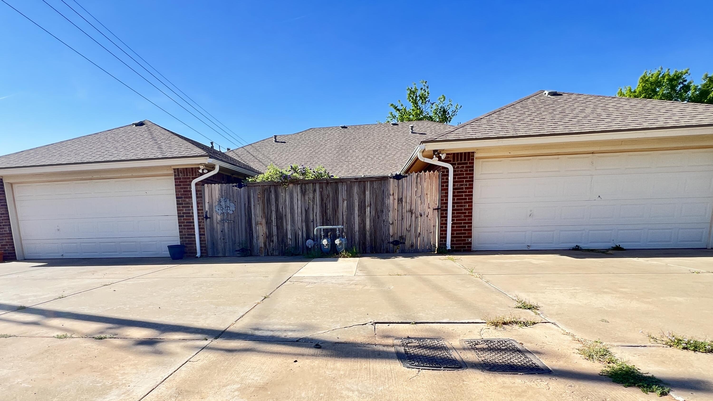 3102 110th Street Lubbock, TX 79423 - Photo 2 of 11 a house view with a backyard space