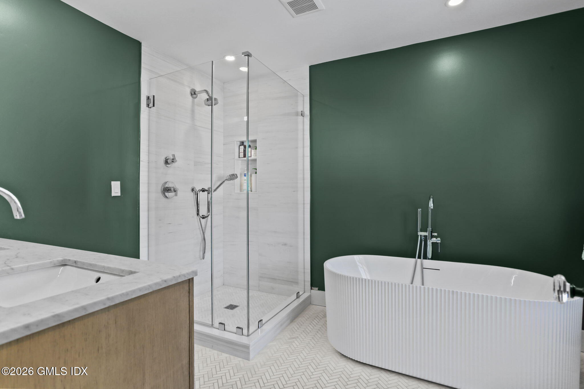 10 Lockwood Road Riverside, CT 06878 - Photo 21 of 38 a bathroom with a bathtub and a shower