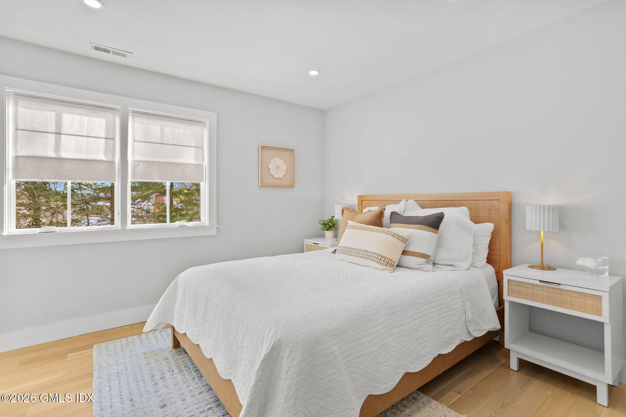 10 Lockwood Road Riverside, CT 06878 - Photo 23 of 38 a bedroom with a bed and a window