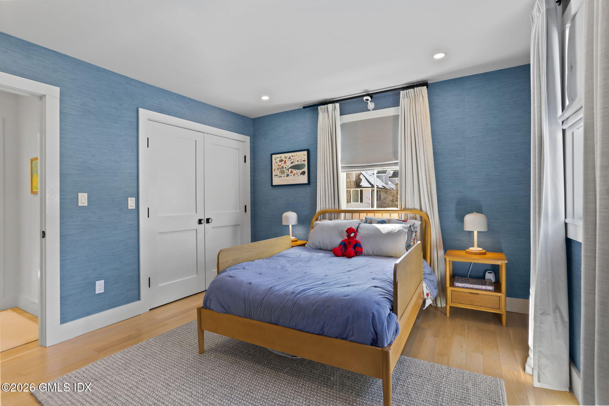 10 Lockwood Road Riverside, CT 06878 - Photo 26 of 38 a bedroom with a bed and a window