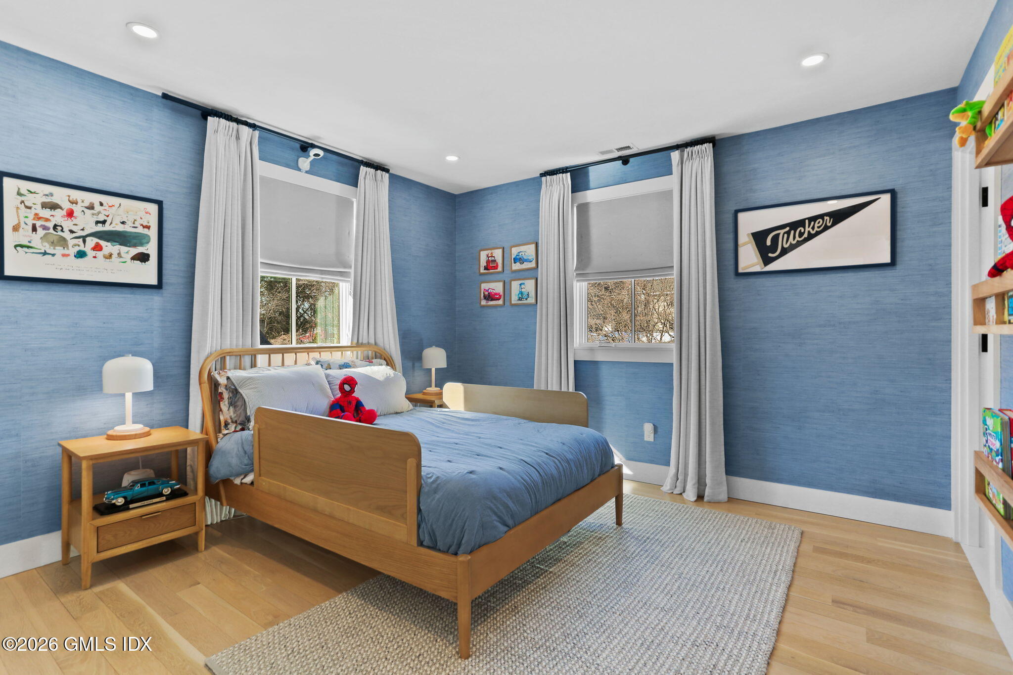 10 Lockwood Road Riverside, CT 06878 - Photo 27 of 38 a living room with a bed furniture and a window