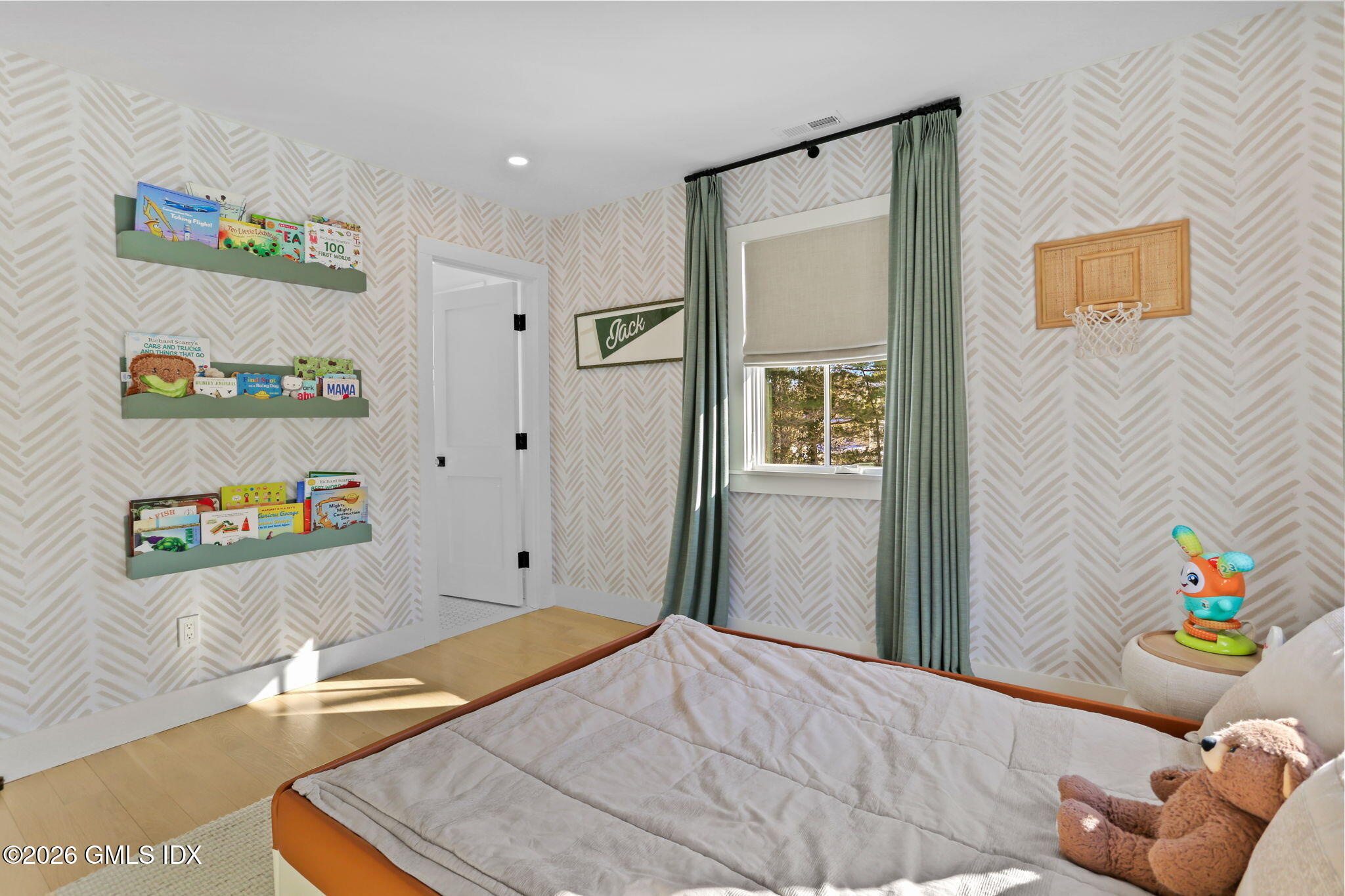 10 Lockwood Road Riverside, CT 06878 - Photo 30 of 38 a bedroom with a bed and a couch