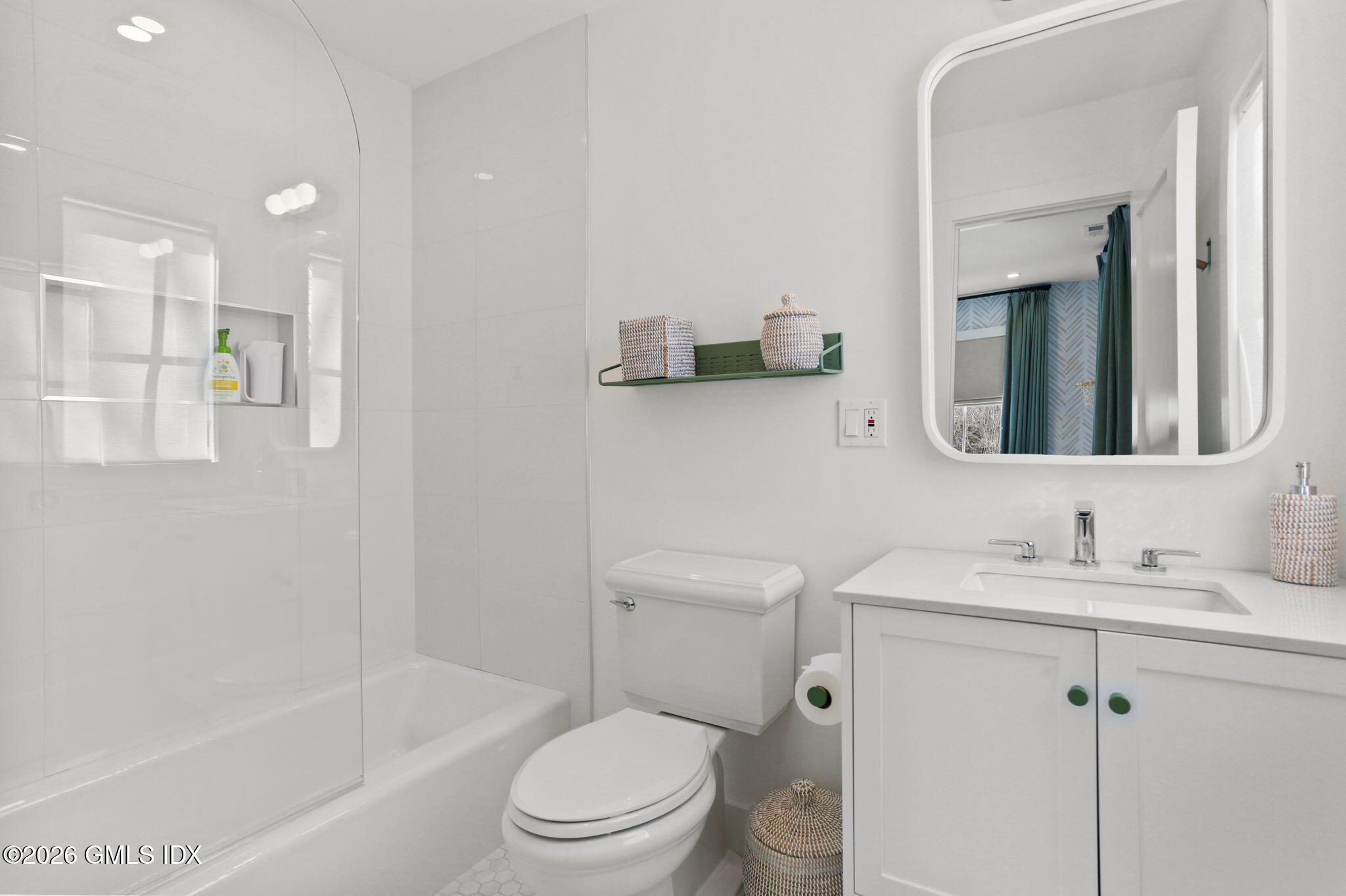 10 Lockwood Road Riverside, CT 06878 - Photo 31 of 38 a bathroom with a sink toilet vanity and shower