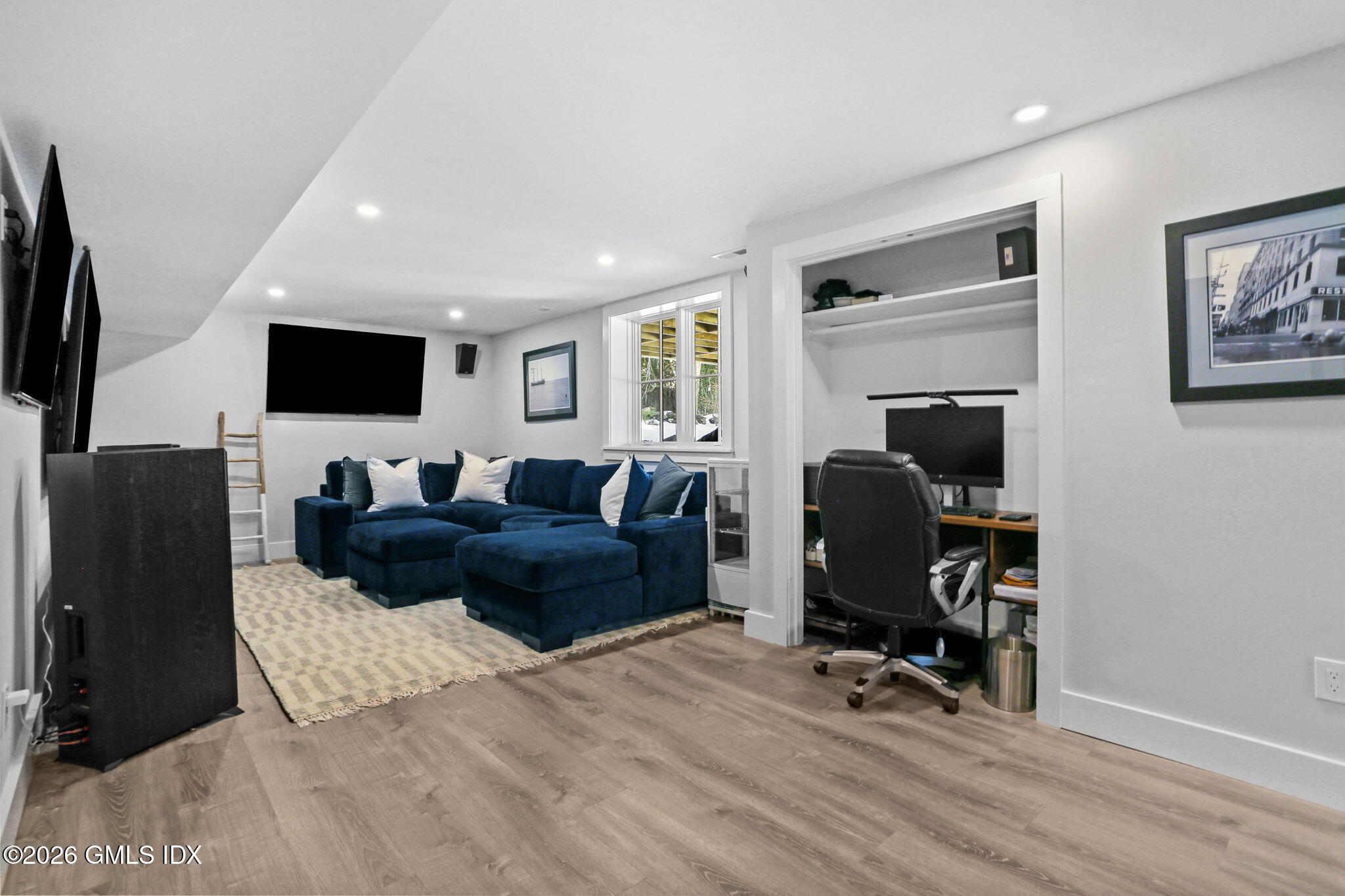 10 Lockwood Road Riverside, CT 06878 - Photo 34 of 38 a view of a livingroom with workspace and a couch