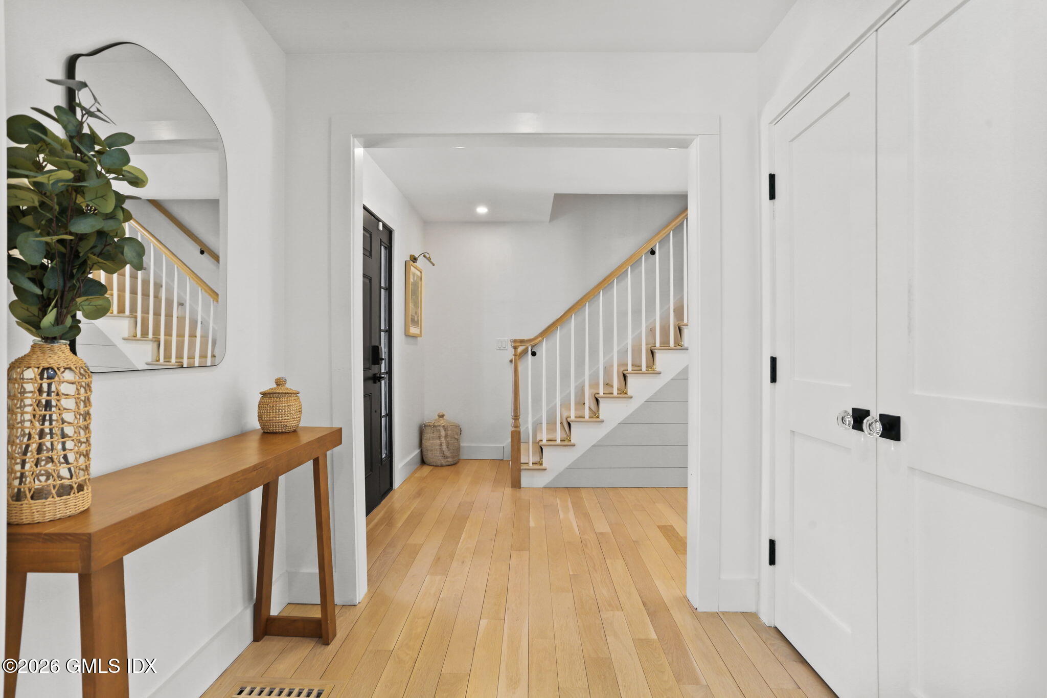10 Lockwood Road Riverside, CT 06878 - Photo 5 of 38 a view of a hallway with wooden floor and staircase