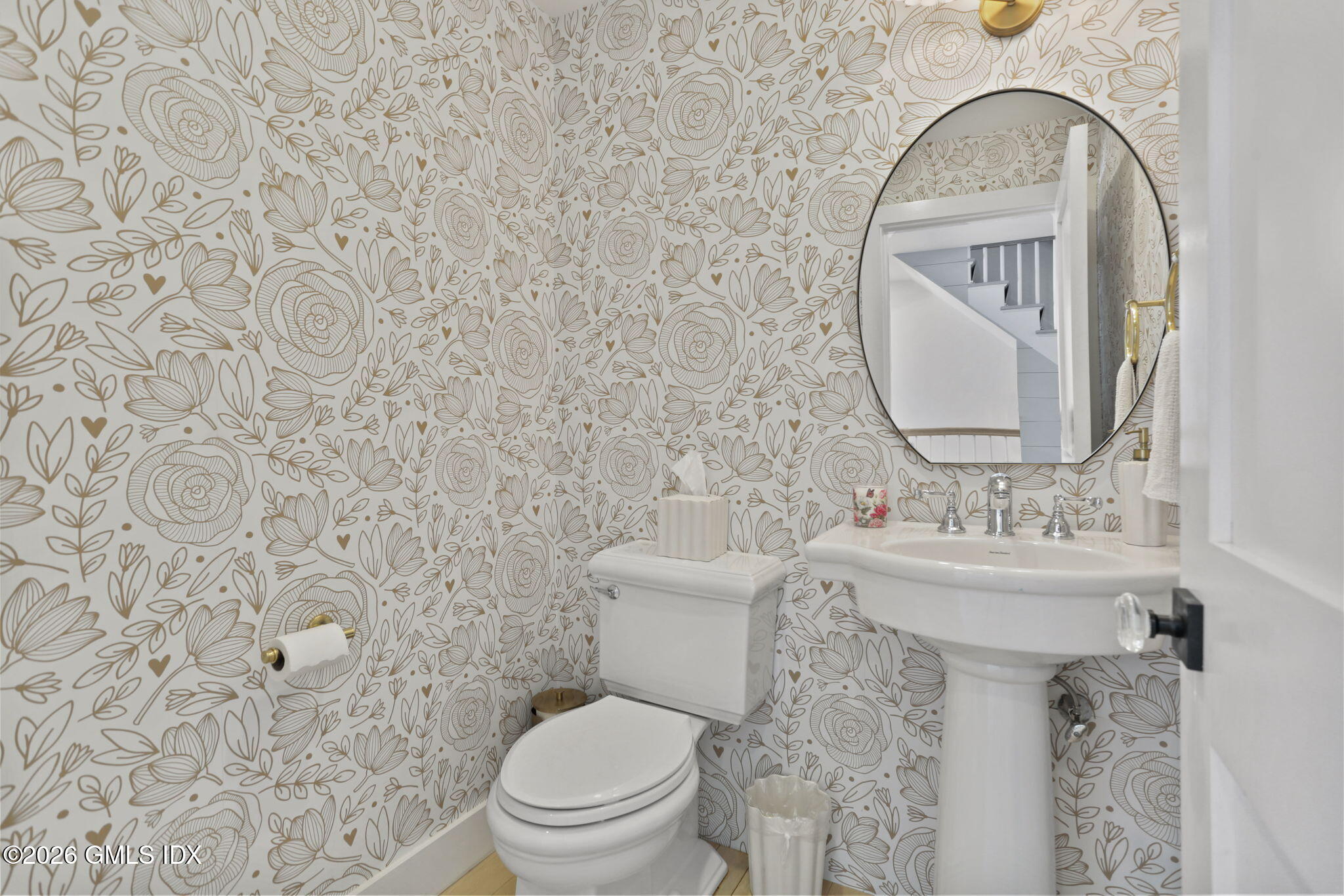 10 Lockwood Road Riverside, CT 06878 - Photo 6 of 38 a bathroom with a toilet sink and mirror