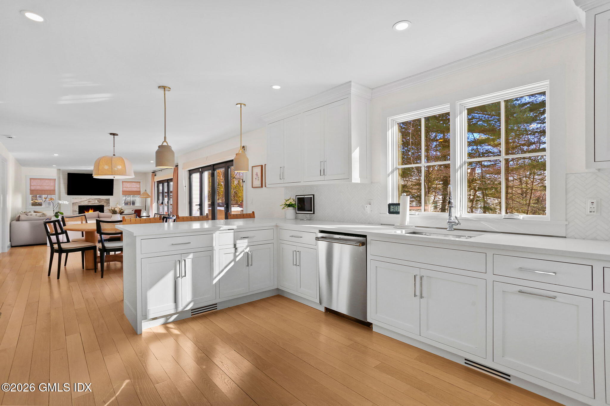 10 Lockwood Road Riverside, CT 06878 - Photo 10 of 38 a kitchen with white cabinets and sink
