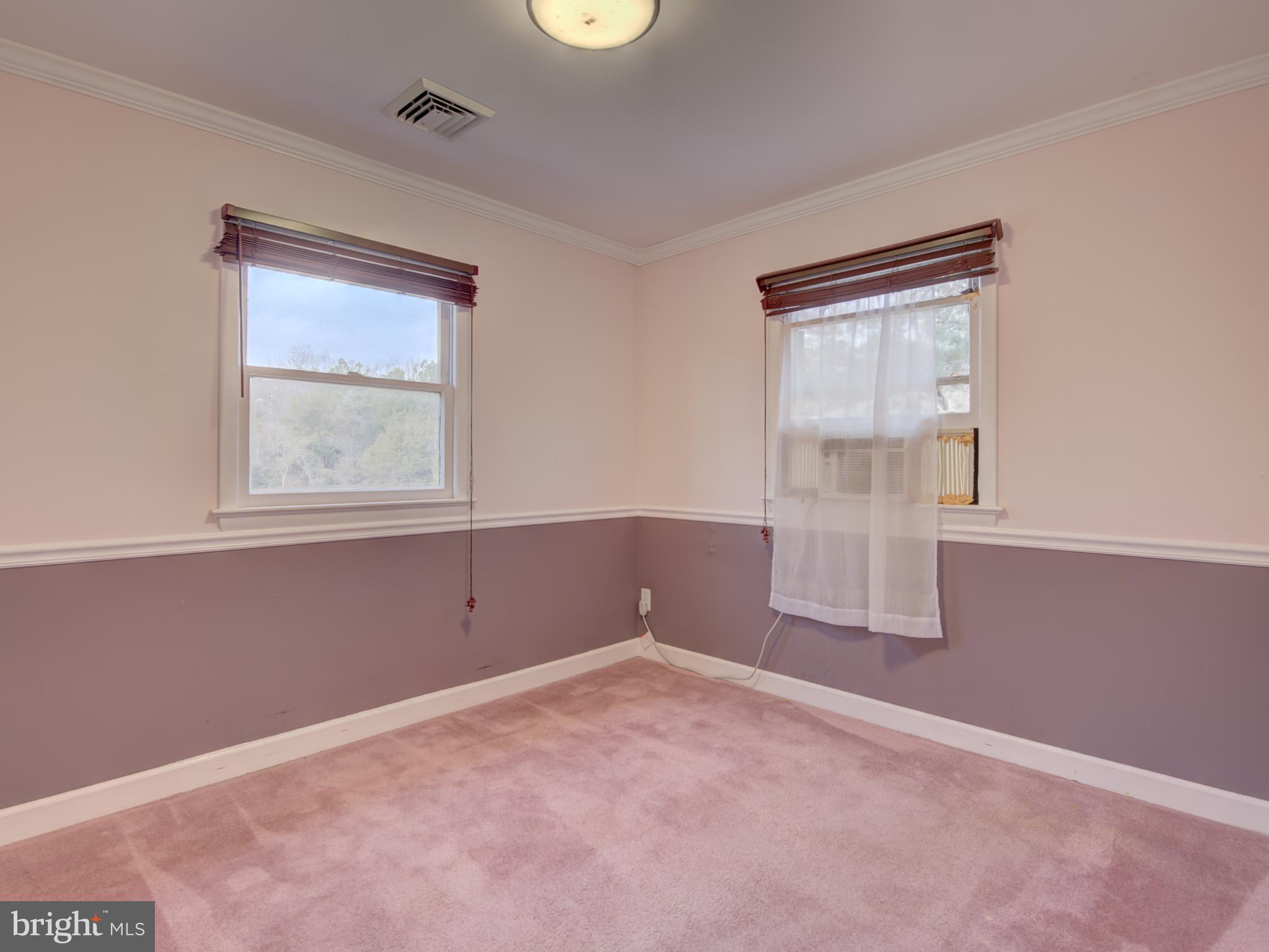 1108 B Shaker Woods Road Herndon, VA 20170 - Photo 12 of 24 an empty room with windows and closet