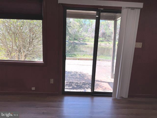 1108 B Shaker Woods Road Herndon, VA 20170 - Photo 24 of 24 a view of a large window with wooden floor and front door