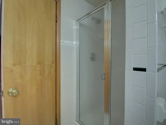 an entryway with wooden floor