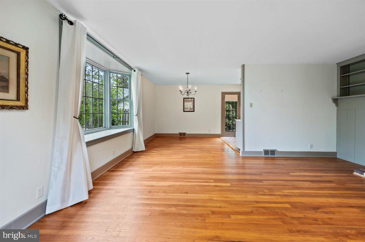 13 Easthill Drive Doylestown, PA 18901 - Photo 12 of 49 LIVING ROOM AND DINING AREA WITH OPEN FLOOR PLAN