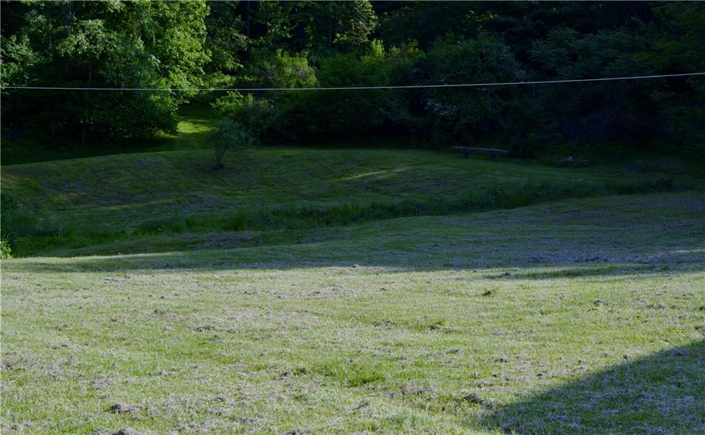 Gently rolling land, much usable yard. 