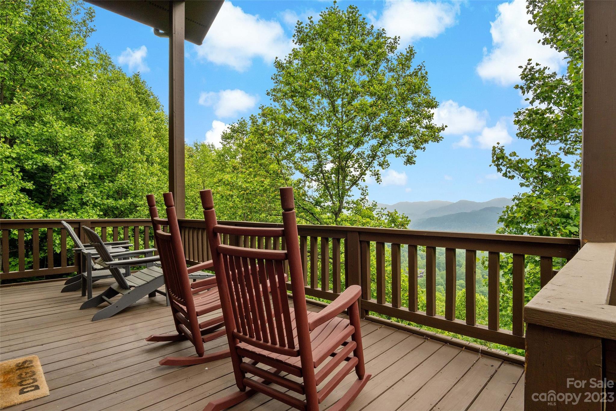 610 Creston Drive Black Mountain, NC 28711 - Photo 14 of 47 a view of balcony with wooden floor and outdoor seating