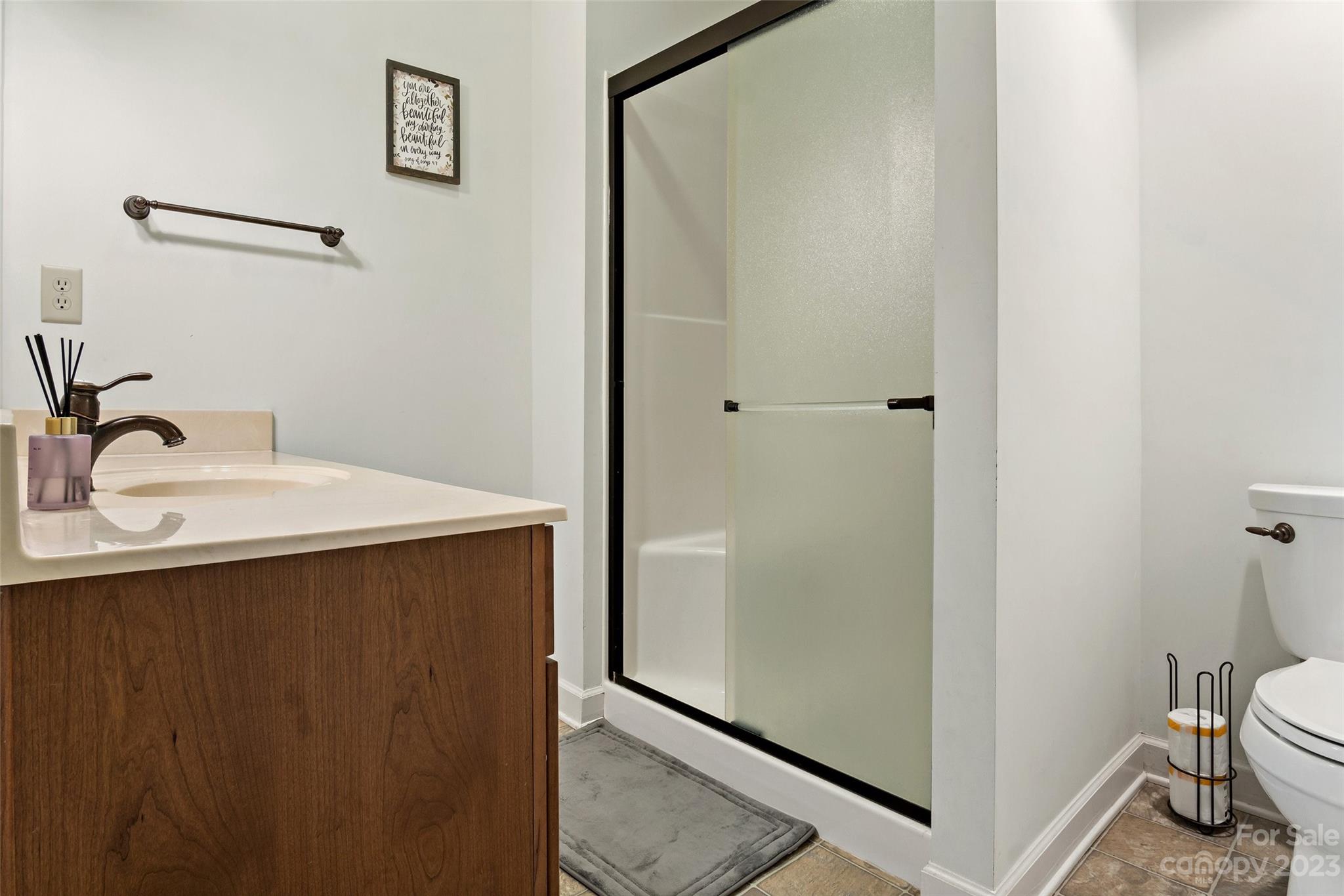 610 Creston Drive Black Mountain, NC 28711 - Photo 39 of 47 a bathroom with a sink and a mirror