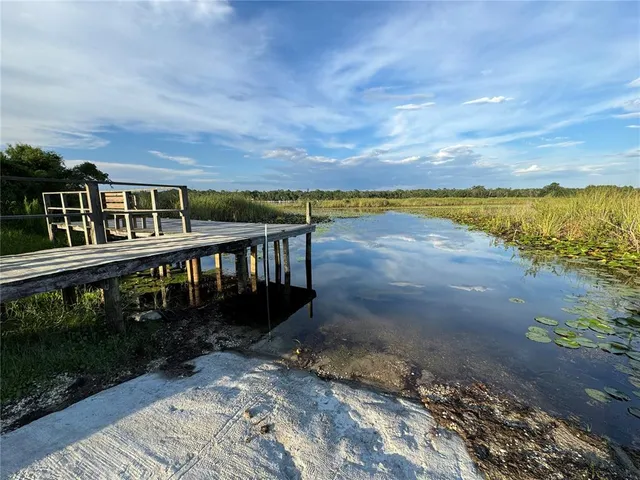 a view of outdoor space and lake view