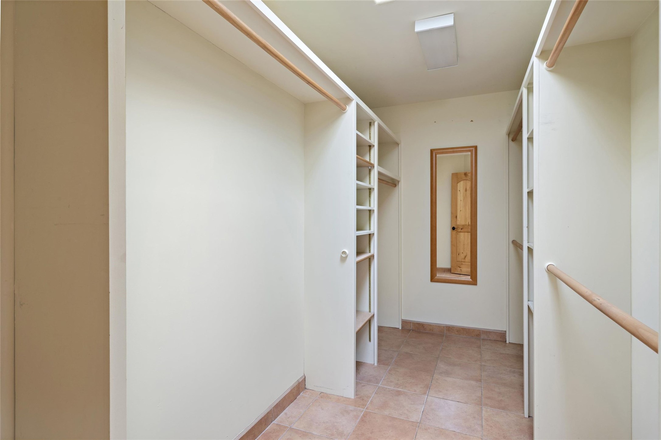 5 Rico Court Santa Fe, NM 87508 - Photo 13 of 32 Large walk in closet in Primary bedroom