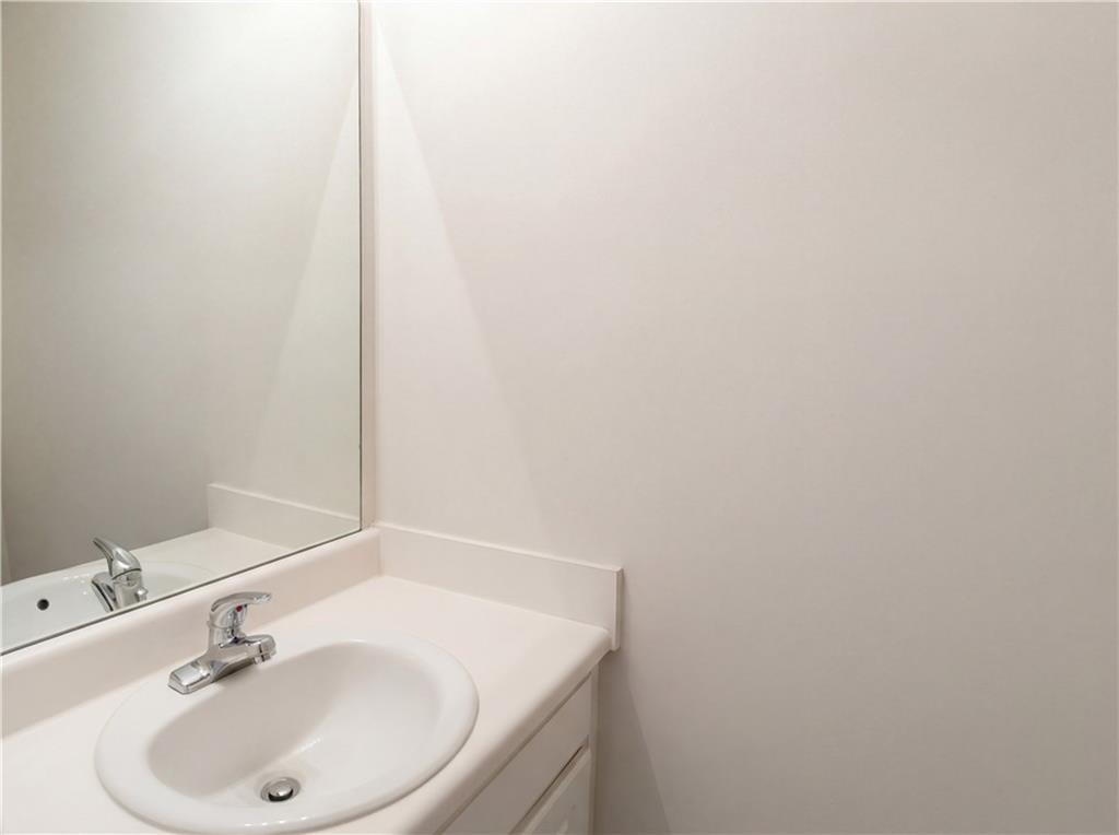 1428 Box Circle Winder, GA 30680 - Photo 13 of 21 a bathroom with a sink and a mirror