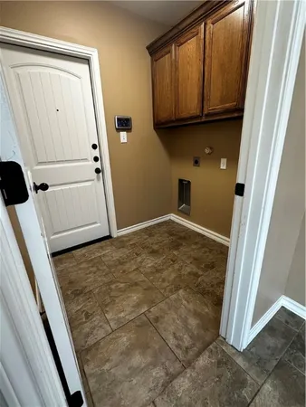 a view of hallway with wooden floor
