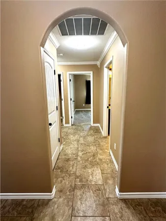 a bathroom with a granite countertop toilet sink and mirror