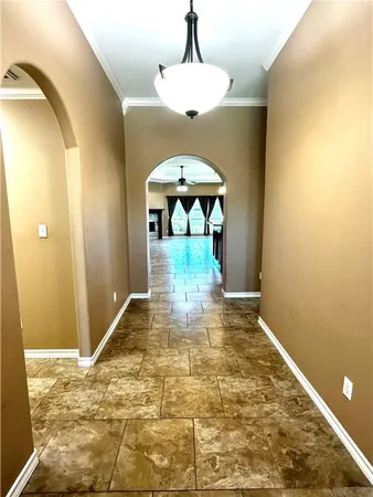 a view of kitchen with granite countertop window and sink