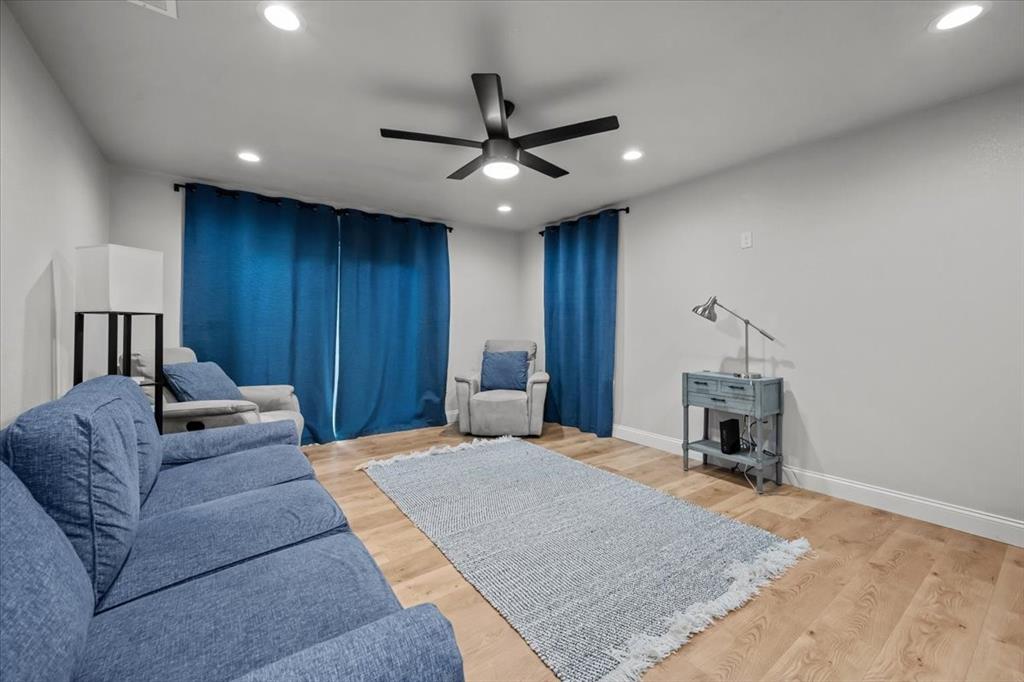 2804 Connor Avenue Waco, TX 76711 - Photo 14 of 21 a living room with furniture and a fireplace