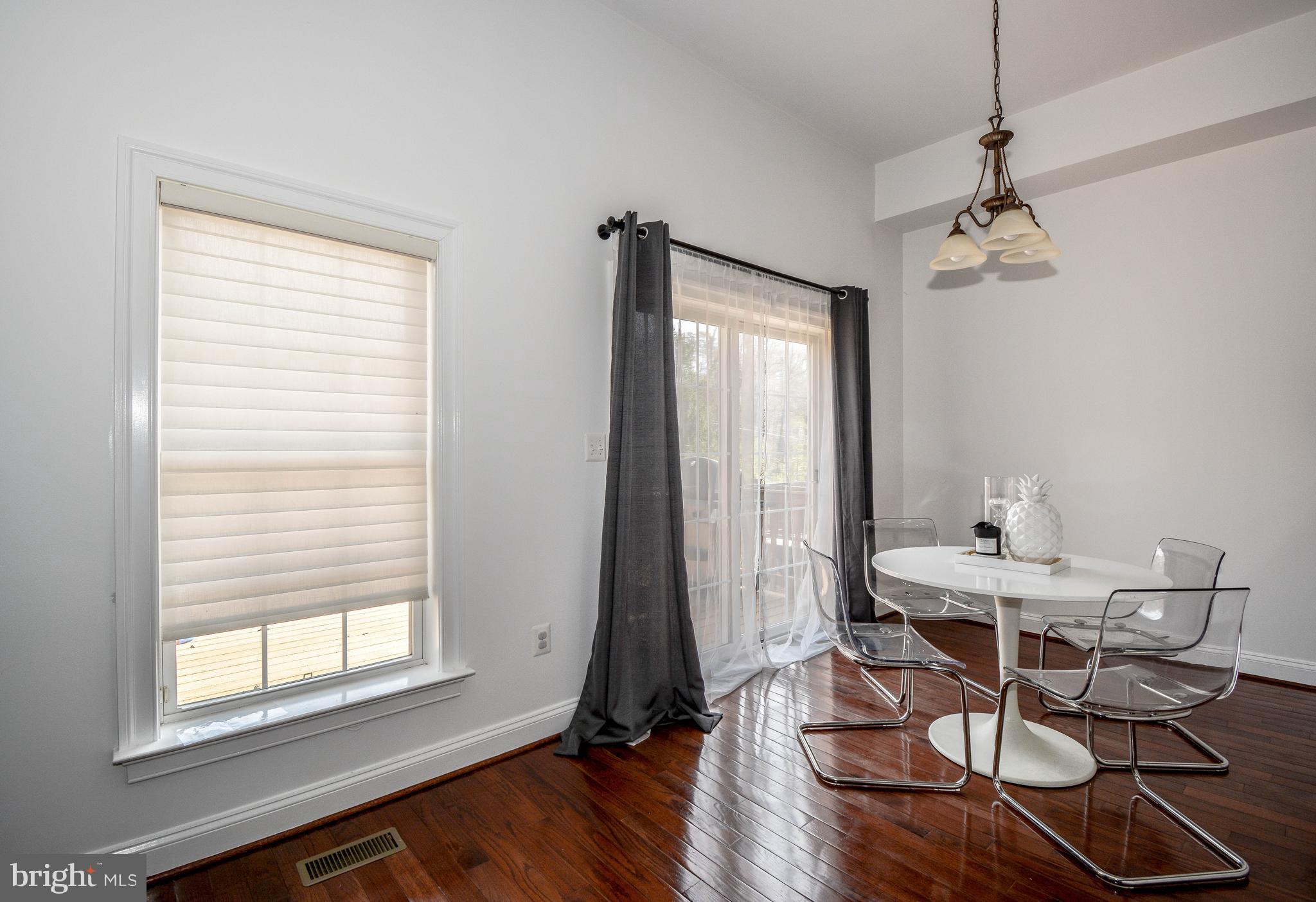 6401 Velliety Lane Springfield, VA 22152 - Photo 12 of 38 Kitchen table space leading to deck