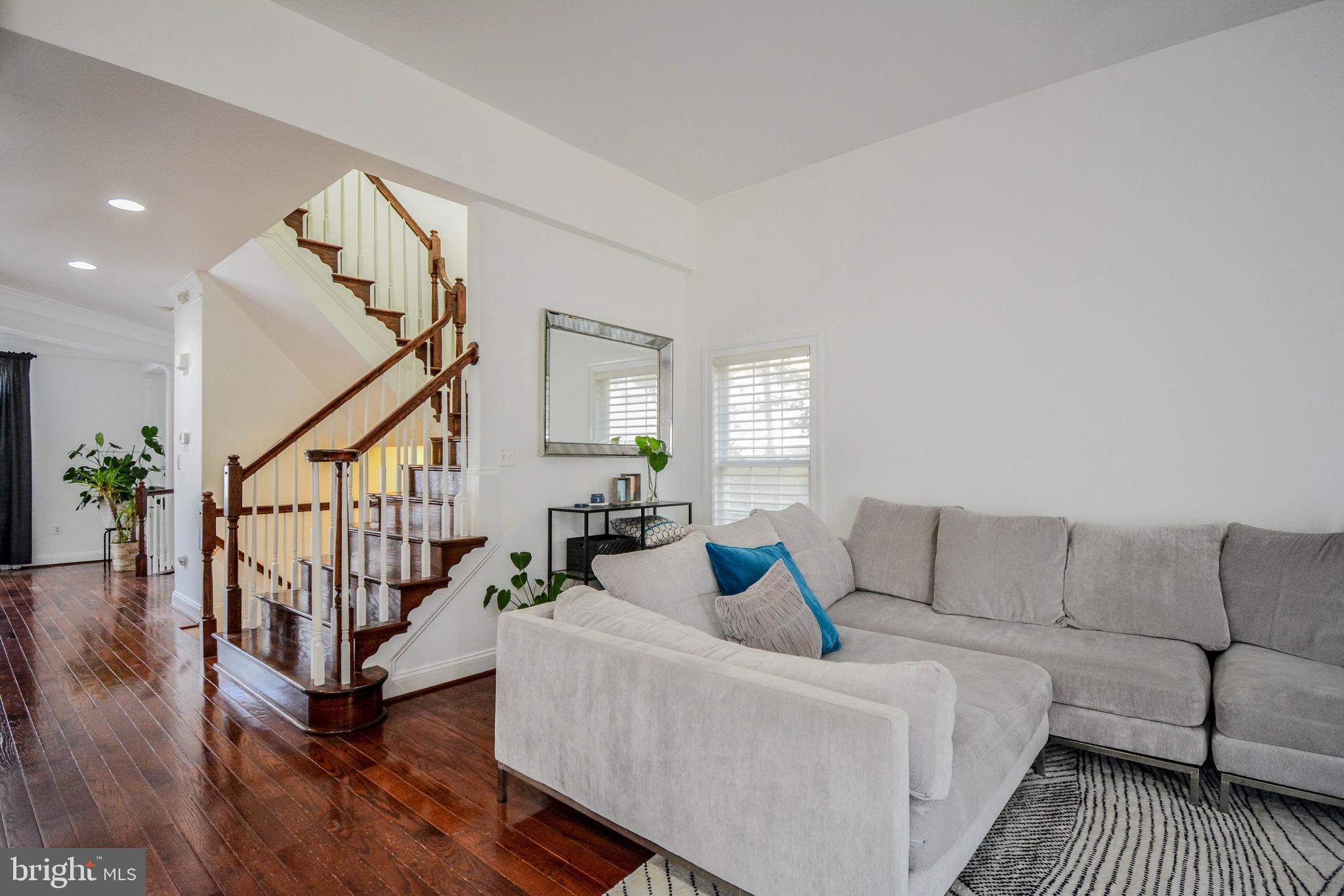 6401 Velliety Lane Springfield, VA 22152 - Photo 13 of 38 Family room and stairs