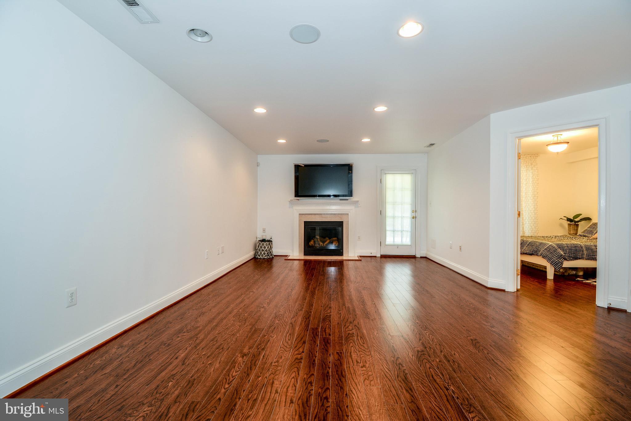 6401 Velliety Lane Springfield, VA 22152 - Photo 32 of 38 Walk out lower level family room
