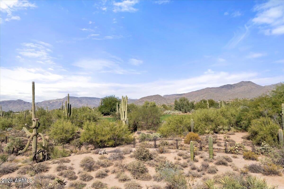 36601 North Mule Train Road, Unit C16 Carefree, AZ 85377 - Photo 14 of 38 a view of a city with a mountain in the background