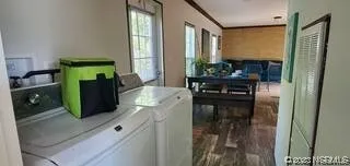a kitchen with stainless steel appliances kitchen island granite countertop a refrigerator and a stove