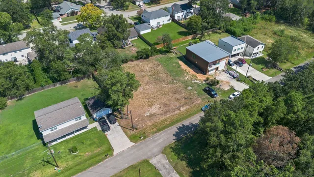 an aerial view of residential house with outdoor space