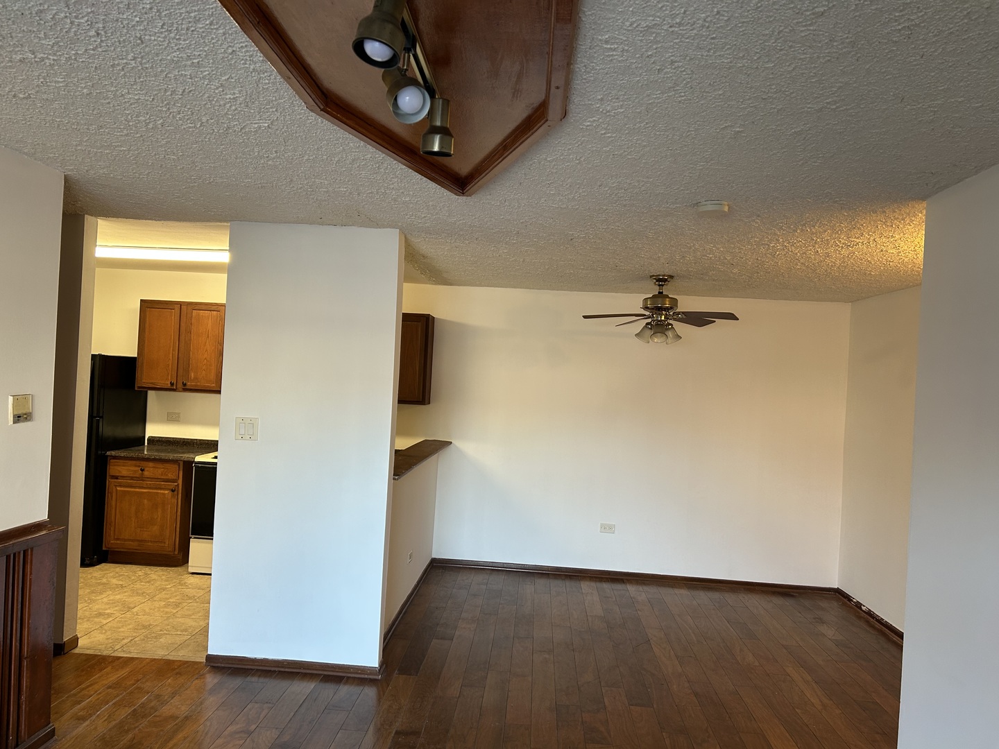 242 George Street, Unit B Bensenville, IL 60106 - Photo 2 of 11 a view of a livingroom with a hall and wooden floor
