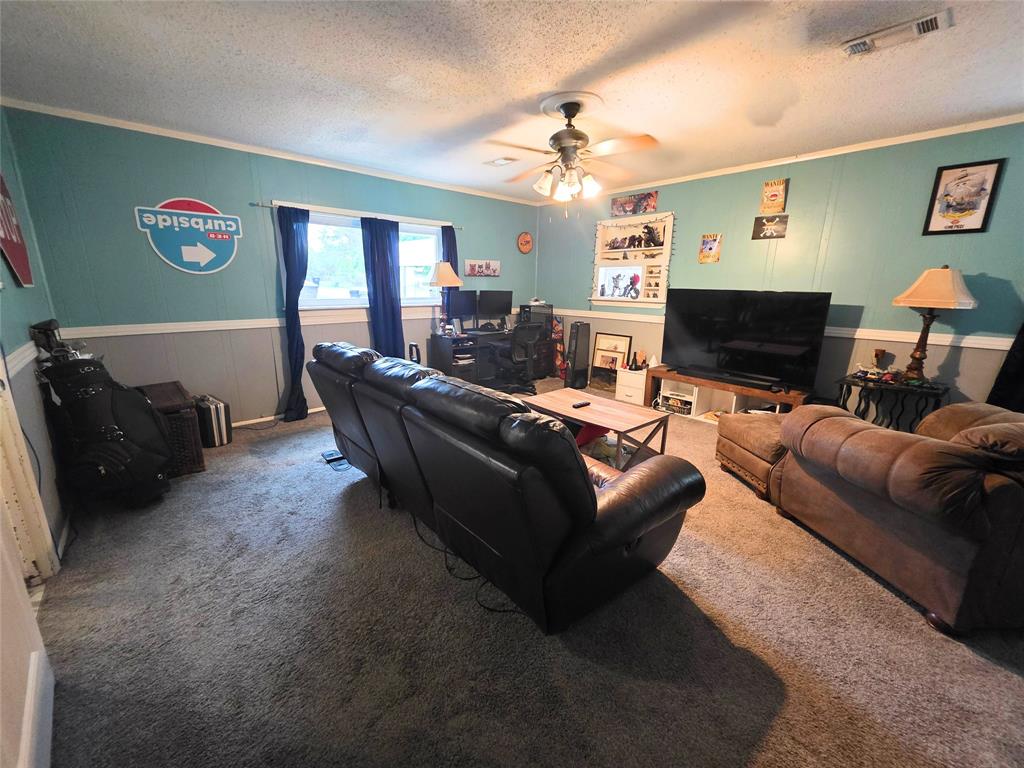 4214 Valview Drive Waco, TX 76708 - Photo 11 of 23 a living room with furniture and a fireplace