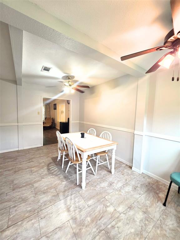 4214 Valview Drive Waco, TX 76708 - Photo 8 of 23 a dining room with furniture and a rug