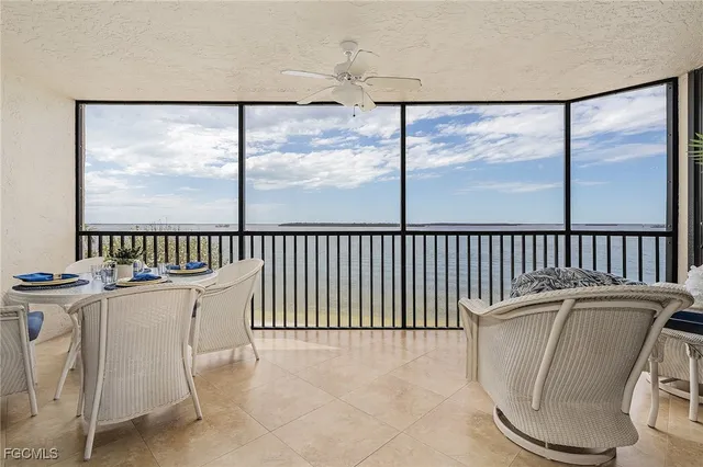 a view of a chair and table in the balcony
