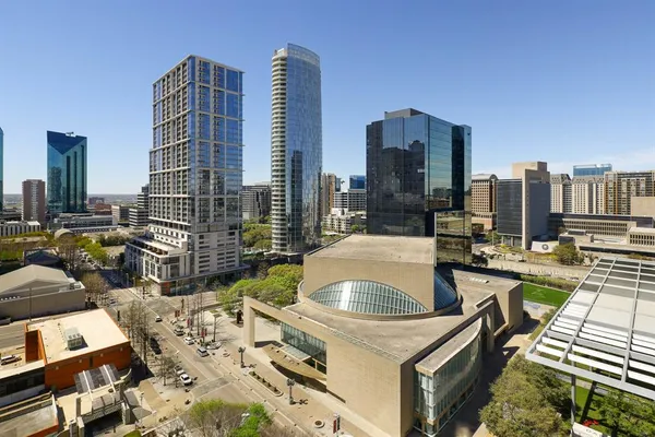 a view of city with tall buildings