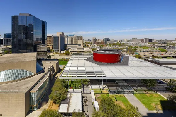 a view of a swimming pool with seating area