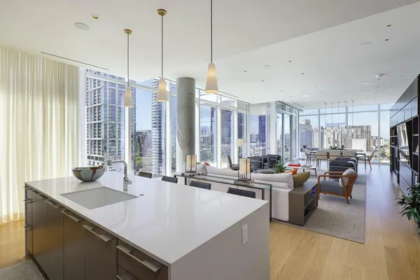 a large kitchen with a large window