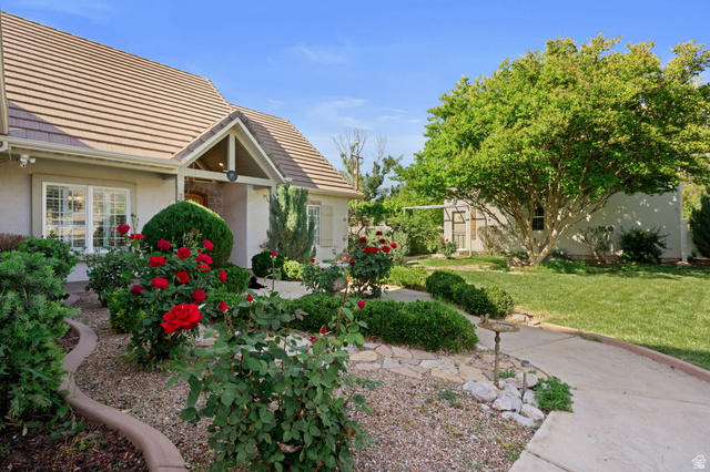 20 Valley Road Leeds, UT 84746 - Photo 27 of 57 Front exterior with a tiled roof and gabled entry