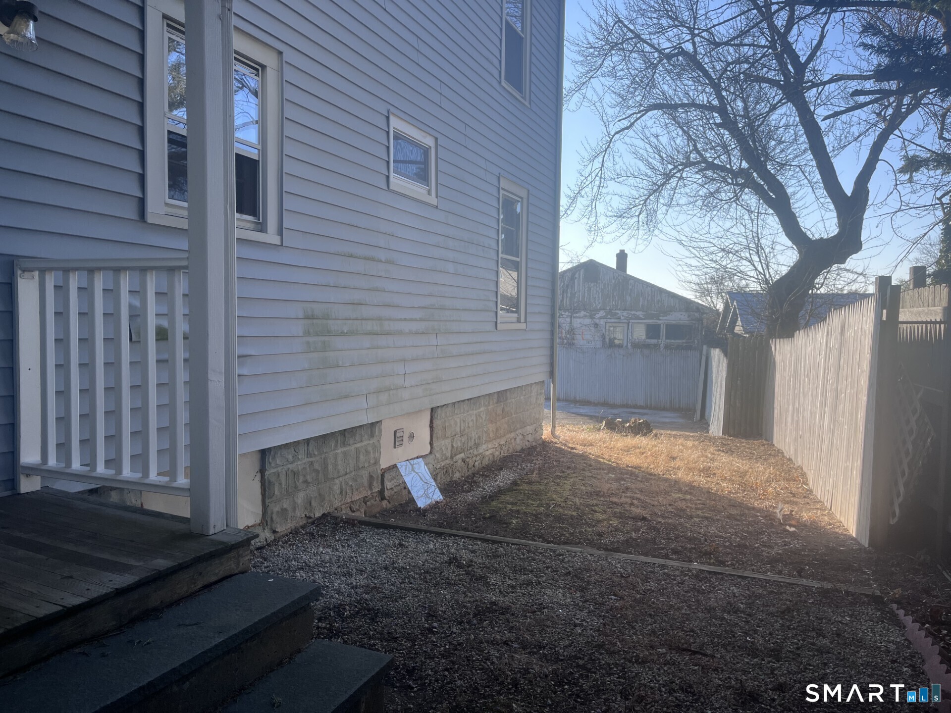 124 Thorpe Street Fairfield, CT 06824 - Photo 22 of 23 a view of backyard of house