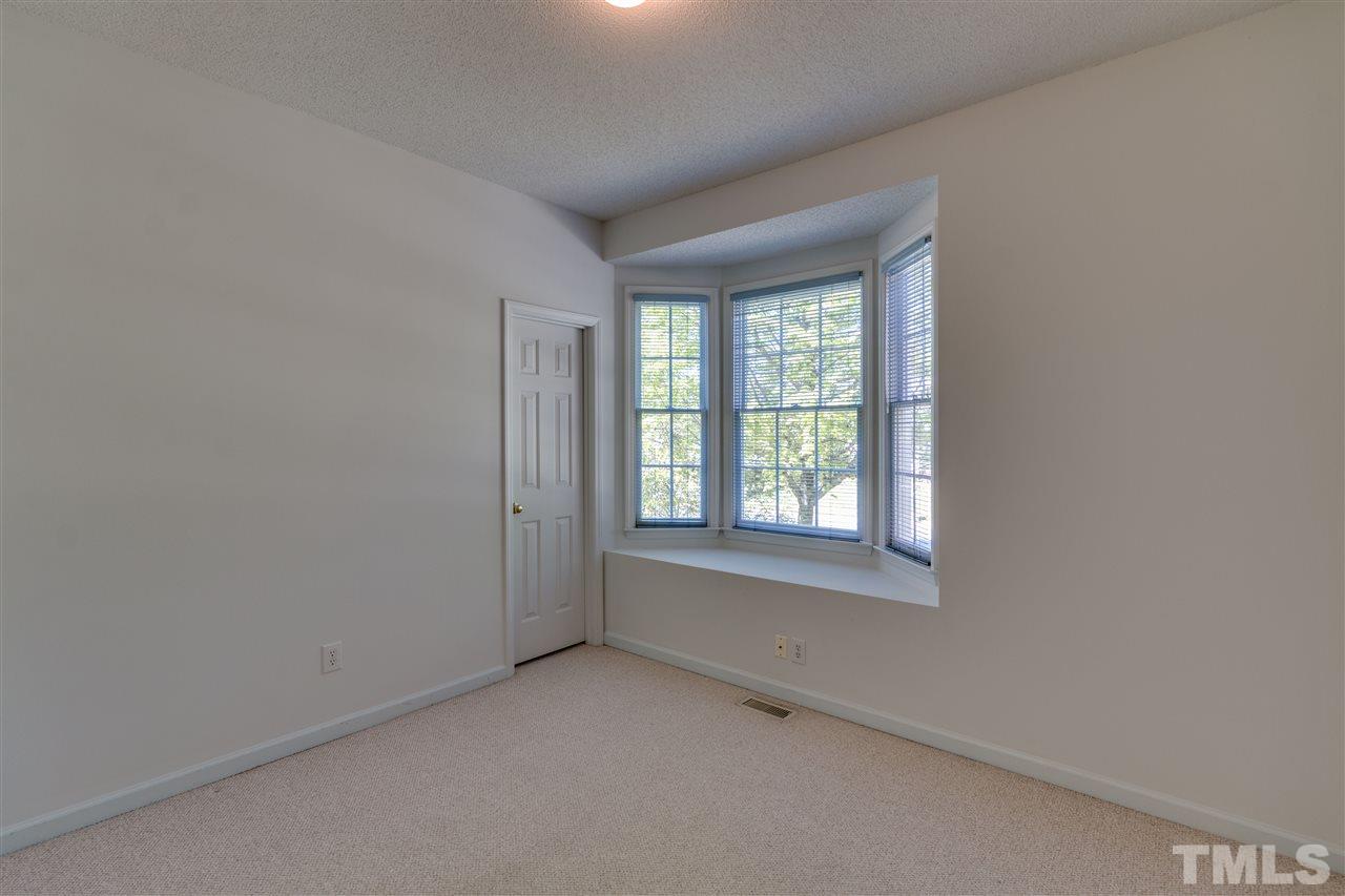 2337 Kendricks Court Raleigh, NC 27613 - Photo 19 of 25 an empty room with a window