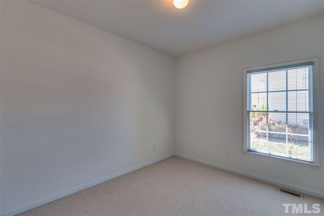 2337 Kendricks Court Raleigh, NC 27613 - Photo 21 of 25 an empty room with a window