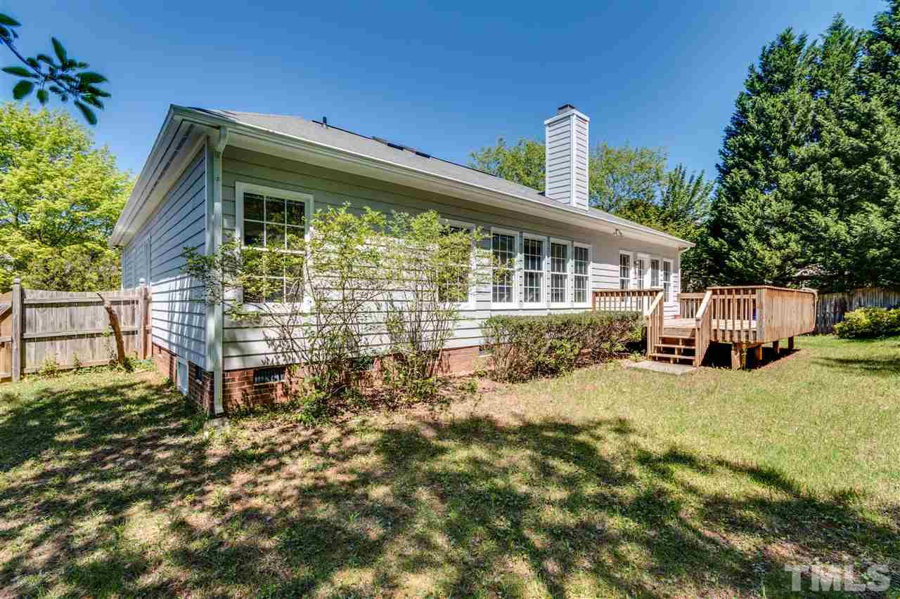 2337 Kendricks Court Raleigh, NC 27613 - Photo 23 of 25 front view of a house with a yard