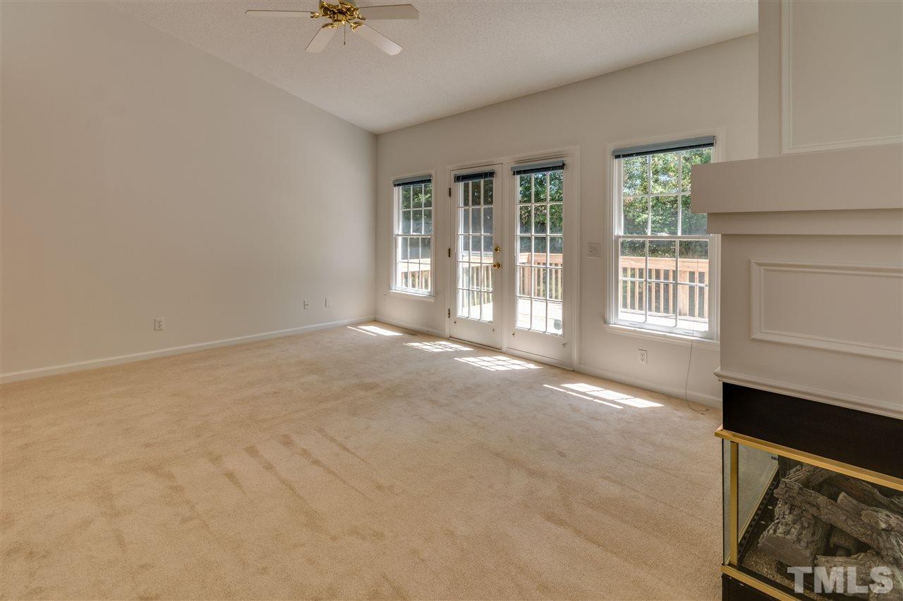 2337 Kendricks Court Raleigh, NC 27613 - Photo 7 of 25 a view of an empty room with a window
