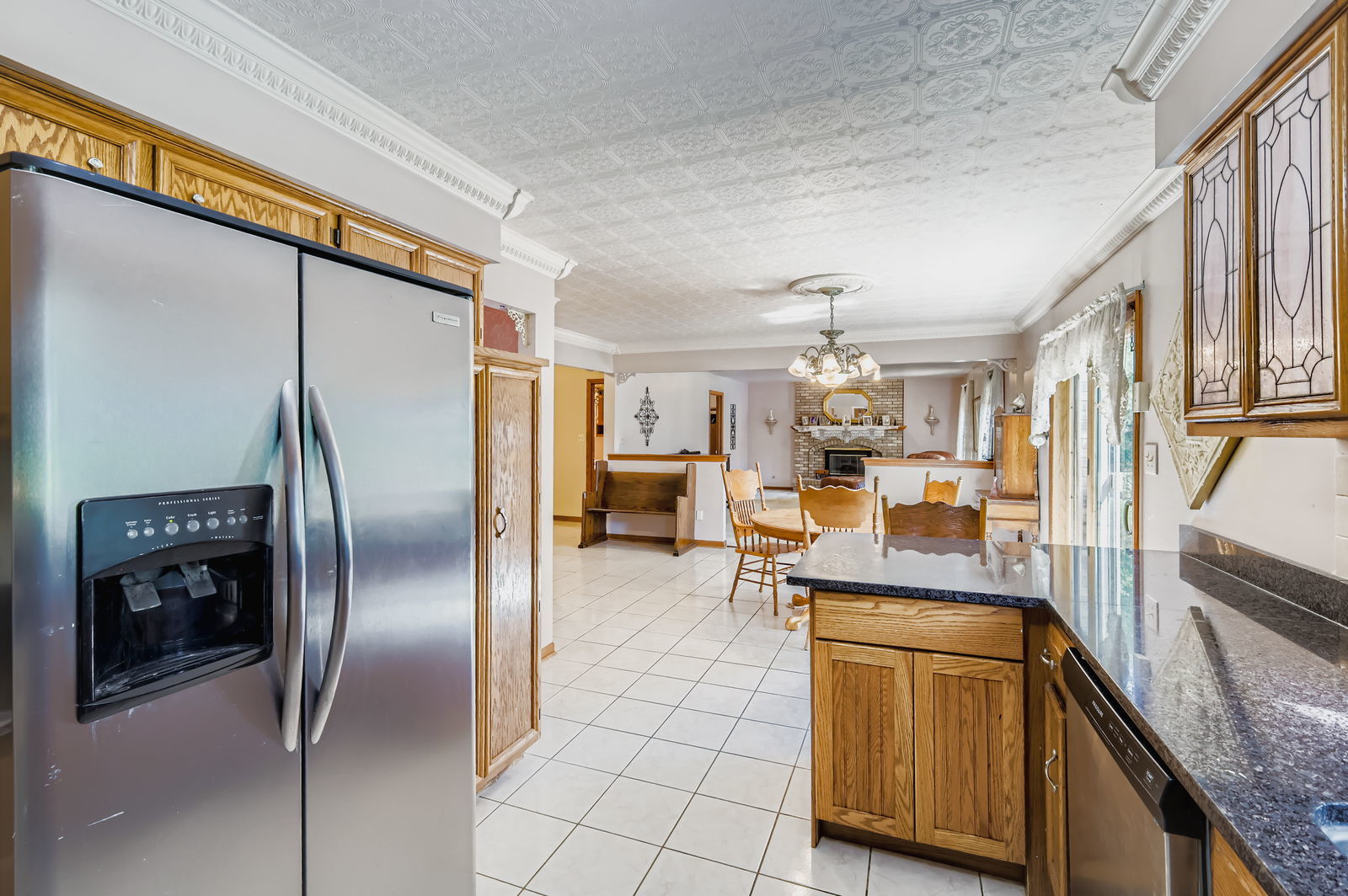 10785 Ashford Avenue Frankfort, IL 60423 - Photo 13 of 42 a kitchen with stainless steel appliances granite countertop a refrigerator and a sink