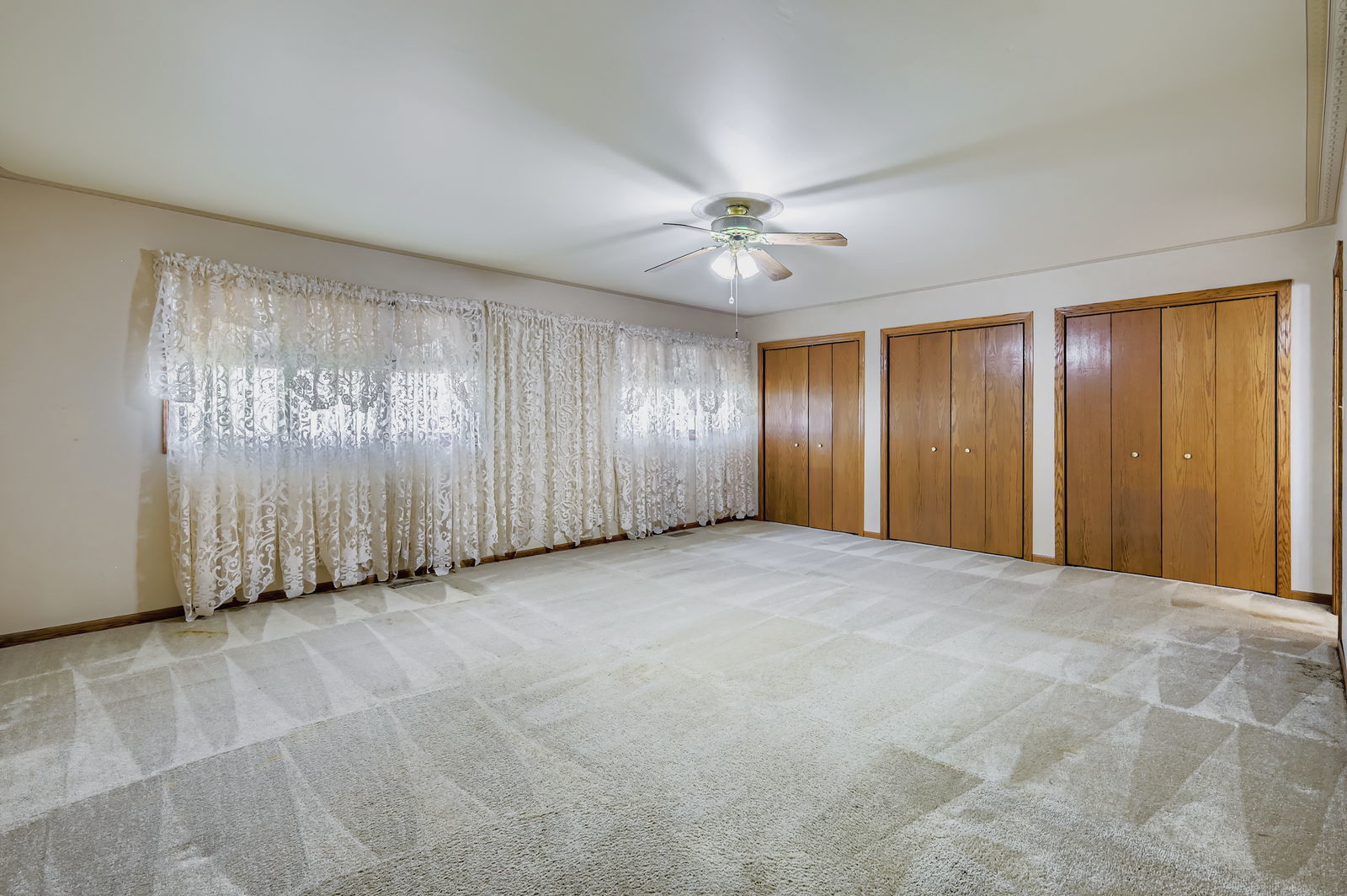 10785 Ashford Avenue Frankfort, IL 60423 - Photo 19 of 42 a view of an empty room with a window